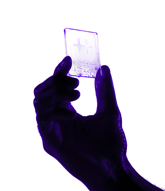 Hand holding a glowing digital card